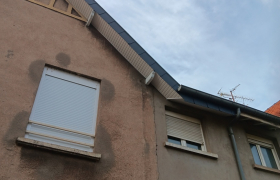 Avant aprés caisson pvc avec pose ardoise sur planche de rive Route de manom a Thionville 